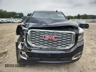 ✅ 2019 GMC Yukon Denali • VIN: 1GKS2CKJXKR397133 • Лот: 89829895. Опубликован ранее на Copart с пробегом 75 762 миль. Бесплатный доступ к архиву аукционных продаж из США и подробный отчёт об истории автомобиля на DreamBid. Изображение 5.