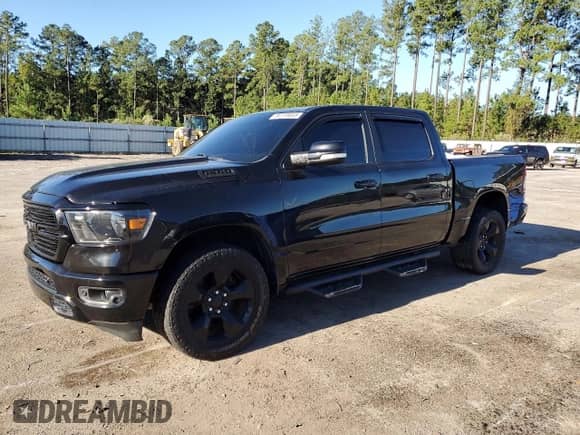 2019 Ram 1500 Big Horn with VIN 1C6SRFFTXKN751915, listed as a Copart auction lot 86119055 with 130,204 mi miles and Salvage title. Bid and sale history available at DreamBid. Image 1.