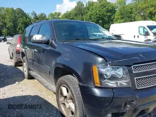 2012 Chevrolet Tahoe LT z VIN 1GNSCBE05CR211898, wystawiony jako IAAI lot #42612993 z przebiegiem 233 367 mil mil oraz . Historia ofert i sprzedaży dostępna na DreamBid. Obrazek 1.