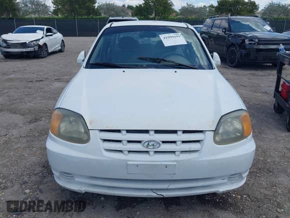 2003 Hyundai Accent GL z VIN KMHCG45C53U468978, wystawiony jako IAAI lot #41999193 z przebiegiem 105 514 mil mil oraz . Historia ofert i sprzedaży dostępna na DreamBid. Obrazek 6.
