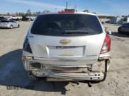 ✅ 2013 Chevrolet Captiva Sport LT • VIN: 3GNAL3EK3DS552038 • Lot: 42969635. Wystawiony na Copart z przebiegiem 135 664 mil. Bezpłatny archiwum sprzedaży aukcyjnych z USA i szczegółowy raport historii pojazdu na DreamBid. Zdjęcie 6.