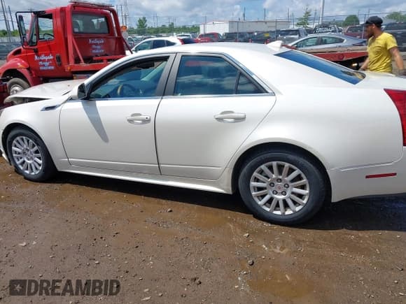 ✅ 2012 Cadillac CTS Luxury • VIN: 1G6DG5E57C0137409 • Lot: 42633890. Wystawiony na IAAI z przebiegiem 86 886 mil. Bezpłatny archiwum sprzedaży aukcyjnych z USA i szczegółowy raport historii pojazdu na DreamBid. Zdjęcie 14.