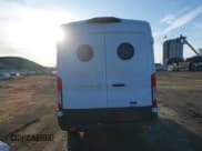 ✅ 2023 Ford Transit Cargo • VIN: 1FTBR1C8XPKB46362 • Lot: 41530807. Listed on IAAI with 46,779 mi. Free auction sales archive from the USA and detailed vehicle history report at DreamBid. Image 16.