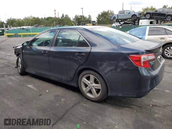 2014 Toyota Camry L with VIN 4T1BF1FK4EU304191, listed as a Copart auction lot 70778585 with 176,301 mi miles and Salvage title. Bid and sale history available at DreamBid. Image 2.