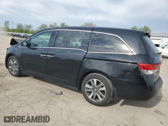 ✅ 2014 Honda Odyssey Touring • VIN: 5FNRL5H94EB006827 • Lot: 55859715. Listed on Copart with 195,131 mi. Free auction sales archive from the USA and detailed vehicle history report at DreamBid. Image 2.