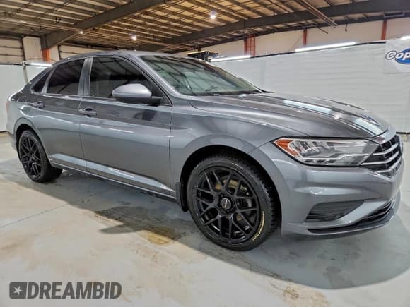 ✅ 2019 Volkswagen Jetta S • VIN: 3VWN57BU4KM008566 • Lot: 94192405. Listed on Copart with 124,660 mi. Free auction sales archive from the USA and detailed vehicle history report at DreamBid. Image 4.