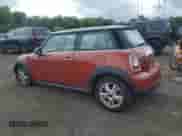 2012 MINI Hardtop with VIN WMWSU3C53CT260060, listed as a Copart auction lot 63656395 with 100,537 mi miles and Clean title. Bid and sale history available at DreamBid. Image 2.