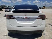 ✅ 2017 Tesla Model X P90D • VIN: 5YJXCAE45HF075748 • Lot: 63442394. Listed on Copart with 126,746 mi. Free auction sales archive from the USA and detailed vehicle history report at DreamBid. Image 6.