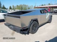 ✅ 2024 Tesla Cybertruck Cyberbeast • VIN: 7G2CEHEEXRA038555 • Lot: 42047963. Listed on IAAI with 14 mi. Free auction sales archive from the USA and detailed vehicle history report at DreamBid. Image 4.