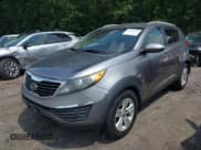 ✅ 2012 Kia Sportage LX • VIN: KNDPB3A21C7300457 • Lot: 42987826. Listed on IAAI with 233,371 mi. Free auction sales archive from the USA and detailed vehicle history report at DreamBid. Image 2.