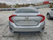 ✅ 2018 Honda Civic LX • VIN: 19XFC2F5XJE027537 • Лот: 94306525. Опубликован ранее на Copart с пробегом 104 457 миль. Бесплатный доступ к архиву аукционных продаж из США и подробный отчёт об истории автомобиля на DreamBid. Изображение 6.
