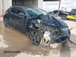 2017 Hyundai Veloster z VIN KMHTC6AD3HU321457, wystawiony jako IAAI lot #43382446 z przebiegiem Nie podano mil oraz . Historia ofert i sprzedaży dostępna na DreamBid. Obrazek 1.