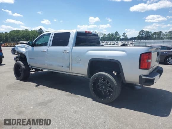 ✅ 2014 GMC Sierra 1500 SLE • VIN: 3GTU2UEC3EG118679 • Лот: 58321225. Опубликован ранее на Copart с пробегом 135 415 миль. Бесплатный доступ к архиву аукционных продаж из США и подробный отчёт об истории автомобиля на DreamBid. Изображение 2.