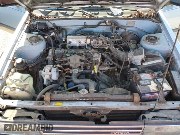 ✅ 1986 Toyota Camry • VIN: JT2SV12E3G6021210 • Lot: 49623985. Wystawiony na Copart z przebiegiem 144 064 mil. Bezpłatny archiwum sprzedaży aukcyjnych z USA i szczegółowy raport historii pojazdu na DreamBid. Zdjęcie 11.