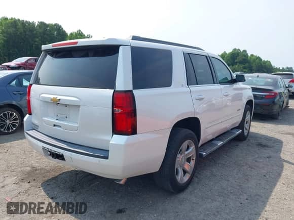 2019 Chevrolet Tahoe LT z VIN 1GNSKBKC5KR153517, wystawiony jako IAAI lot #42390642 z przebiegiem 52 034 mil mil oraz . Historia ofert i sprzedaży dostępna na DreamBid. Obrazek 4.