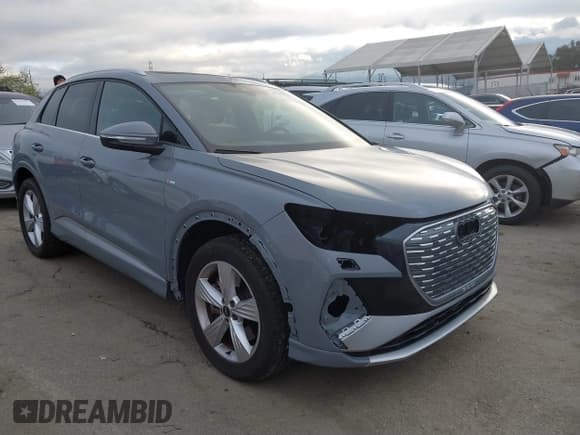 ✅ 2023 Audi Q4 e-tron Prestige • VIN: WA1M2BFZ0PP039552 • Лот: 41765914. Опубликован ранее на IAAI с пробегом 23 149 миль. Бесплатный доступ к архиву аукционных продаж из США и подробный отчёт об истории автомобиля на DreamBid. Изображение 1.