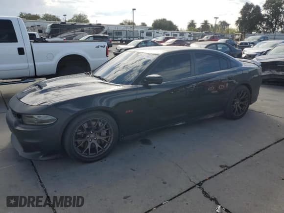 ✅ 2017 Dodge Charger R/T Scat Pack • VIN: 2C3CDXGJ5HH589566 • Lot: 82114225. Listed on Copart with 77,865 mi. Free auction sales archive from the USA and detailed vehicle history report at DreamBid. Image 1.