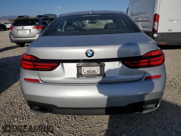 ✅ 2017 BMW 7 Series 740i • VIN: WBA7E2C30HG740990 • Lot: 67099225. Listed on Copart with 102,873 mi. Free auction sales archive from the USA and detailed vehicle history report at DreamBid. Image 6.