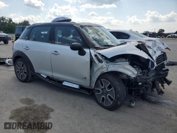 ✅ 2012 MINI Countryman S • VIN: WMWZC5C52CWL61201 • Лот: 69656135. Опубликован ранее на Copart с пробегом 87 031 миль. Бесплатный доступ к архиву аукционных продаж из США и подробный отчёт об истории автомобиля на DreamBid. Изображение 4.