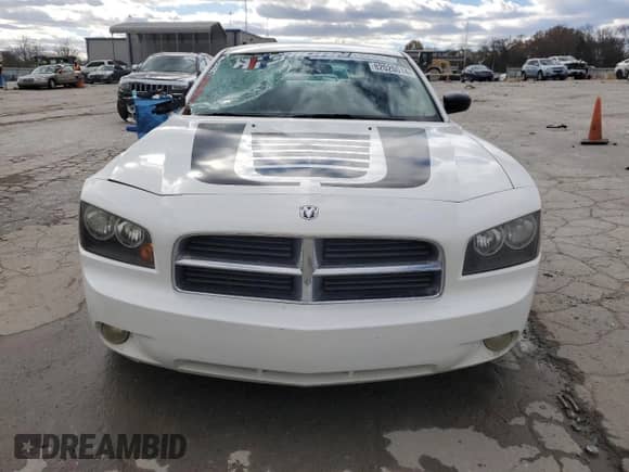 2009 Dodge Charger SXT с VIN 2B3KA33V69H576152, выставлен на аукционе Copart как лот 82020014 с пробегом 129 304 миль миль и Списание • Salvage title. История ставок и продаж доступна на DreamBid. Изображение 5.