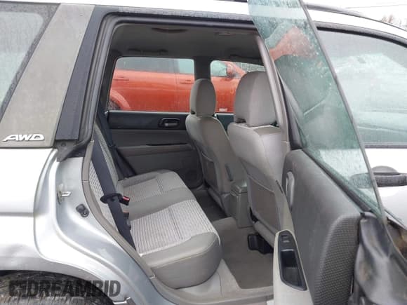 ✅ 2004 Subaru Forester XS • VIN: JF1SG65604H721338 • Lot: 43562108. Listed on IAAI with 194,707 mi. Free auction sales archive from the USA and detailed vehicle history report at DreamBid. Image 8.