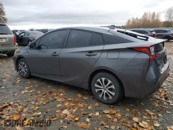 ✅ 2021 Toyota Prius XLE • VIN: JTDL9MFU0M3028227 • Lot: 92247245. Listed on Copart with 81,491 mi. Free auction sales archive from the USA and detailed vehicle history report at DreamBid. Image 2.