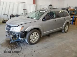 ✅ 2017 Dodge Journey SE • VIN: 3C4PDCAB9HT559971 • Лот: 80208395. Опубликован ранее на Copart с пробегом 119 903 миль. Бесплатный доступ к архиву аукционных продаж из США и подробный отчёт об истории автомобиля на DreamBid. Изображение 1.