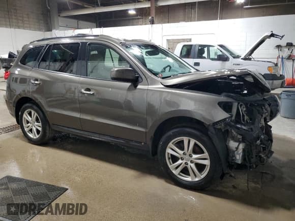 ✅ 2012 Hyundai Santa Fe Limited • VIN: 5XYZKDAGXCG169123 • Lot: 85311684. Listed on Copart with 144,929 mi. Free auction sales archive from the USA and detailed vehicle history report at DreamBid. Image 4.