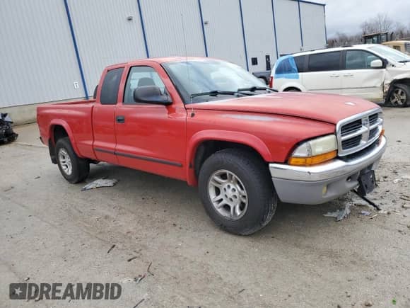 2003 Dodge Dakota SLT with VIN 1D7HL42N93S105421, listed as a Copart auction lot 83088264 with 210,194 mi miles and Salvage title. Bid and sale history available at DreamBid. Image 4.
