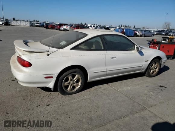 ✅ 1996 Mazda MX-6 • VIN: 1YVGE31D5T5566451 • Lot: 88347915. Listed on Copart with 172,188 mi. Free auction sales archive from the USA and detailed vehicle history report at DreamBid. Image 3.