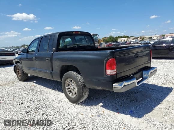 ✅ 2001 Dodge Dakota Sport • VIN: 1B7GL2AN01S101329 • Lot: 49265355. Wystawiony na Copart z przebiegiem 297 651 mil. Bezpłatny archiwum sprzedaży aukcyjnych z USA i szczegółowy raport historii pojazdu na DreamBid. Zdjęcie 2.