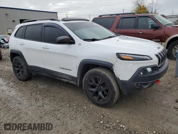 ✅ 2014 Jeep Cherokee Trailhawk • VIN: 1C4PJMBS8EW267778 • Lot: 85760065. Wystawiony na Copart z przebiegiem 162 614 mil. Bezpłatny archiwum sprzedaży aukcyjnych z USA i szczegółowy raport historii pojazdu na DreamBid. Zdjęcie 4.