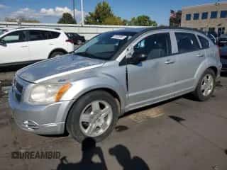 2009 Dodge Caliber SXT с VIN 1B3HB48A29D133027, выставлен на аукционе Copart как лот 75720884 с пробегом 210 891 миль миль и Списание • Salvage title. История ставок и продаж доступна на DreamBid. Изображение 1.