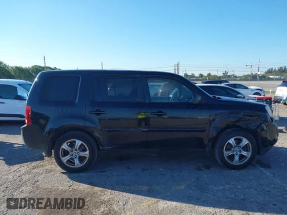 ✅ 2013 Honda Pilot EX-L • VIN: 5FNYF3H66DB017923 • Lot: 41677898. Listed on IAAI with 219,037 mi. Free auction sales archive from the USA and detailed vehicle history report at DreamBid. Image 14.