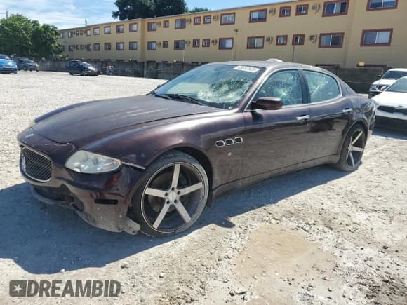 ✅ 2006 Maserati Quattroporte • VIN: ZAMCE39A560021703 • Лот: 85082625. Опубликован ранее на Copart с пробегом Не указан. Бесплатный доступ к архиву аукционных продаж из США и подробный отчёт об истории автомобиля на DreamBid. Изображение 1.