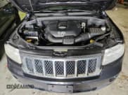 ✅ 2013 Jeep Grand Cherokee Laredo • VIN: 1C4RJFAG4DC556254 • Lot: 86259695. Listed on Copart with 248,765 mi. Free auction sales archive from the USA and detailed vehicle history report at DreamBid. Image 12.