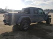 ✅ 2024 Jeep Gladiator Mojave X • VIN: 1C6JJTEG5RL115608 • Lot: 46787955. Listed on Copart with 7,283 mi. Free auction sales archive from the USA and detailed vehicle history report at DreamBid. Image 3.