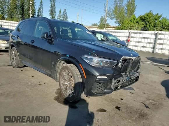 ✅ 2019 BMW X5 xDrive50i • VIN: 5UXJU2C52KLN66897 • Lot: 95786095. Wystawiony na Copart z przebiegiem 90 242 mil. Bezpłatny archiwum sprzedaży aukcyjnych z USA i szczegółowy raport historii pojazdu na DreamBid. Zdjęcie 14.