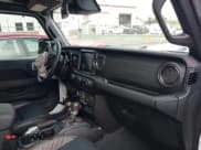 ✅ 2021 Jeep Wrangler Unlimited Sahara • VIN: 1C4HJXEG1MW597127 • Lot: 43354032. Listed on IAAI with 82,436 mi. Free auction sales archive from the USA and detailed vehicle history report at DreamBid. Image 17.