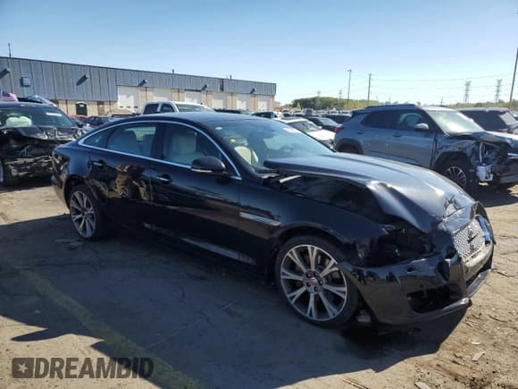 ✅ 2017 Jaguar XJ Portfolio • VIN: SAJWJ2GD7H8W09418 • Lot: 85906035. Listed on Copart with 91,515 mi. Free auction sales archive from the USA and detailed vehicle history report at DreamBid. Image 4.