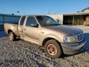 ✅ 2001 Ford F-150 XL • VIN: 1FTZX17201NB01673 • Lot: 85209505. Listed on Copart with 209,967 mi. Free auction sales archive from the USA and detailed vehicle history report at DreamBid. Image 4.