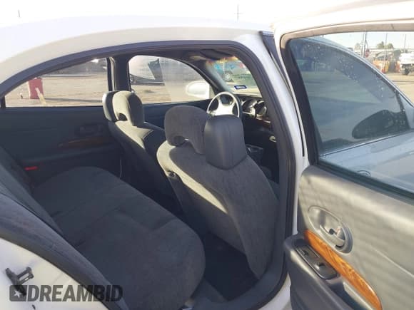 ✅ 2003 Buick LeSabre Custom • VIN: 1G4HP52K334125948 • Lot: 43704597. Wystawiony na IAAI z przebiegiem 125 484 mil. Bezpłatny archiwum sprzedaży aukcyjnych z USA i szczegółowy raport historii pojazdu na DreamBid. Zdjęcie 8.