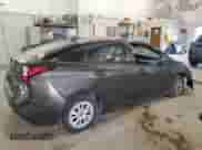 2021 Toyota Prius L Eco с VIN JTDKAMFU5M3143781, выставлен на аукционе Copart как лот 81028565 с пробегом 52 355 миль миль и Списание • Salvage title. История ставок и продаж доступна на DreamBid. Изображение 3.