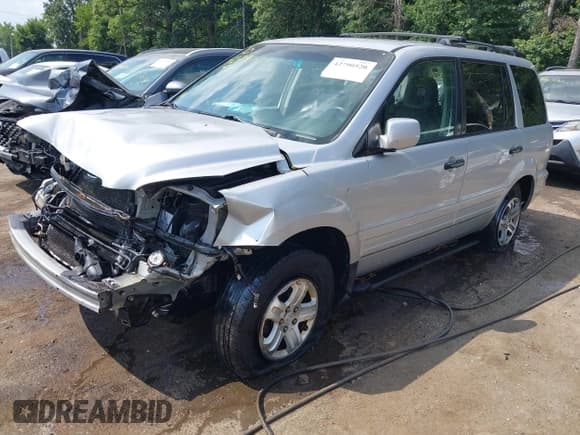 ✅ 2003 Honda Pilot EX • VIN: 2HKYF18773H507977 • Lot: 42790520. Listed on IAAI with 233,859 mi. Free auction sales archive from the USA and detailed vehicle history report at DreamBid. Image 2.