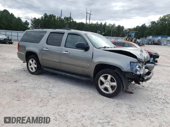 2008 Chevrolet Suburban LT с VIN 1GNFC16038J231941, выставлен на аукционе Copart как лот 76061534 с пробегом 239 562 миль миль и Списание • Salvage title. История ставок и продаж доступна на DreamBid. Изображение 4.