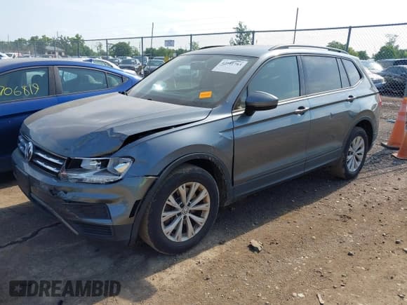 ✅ 2018 Volkswagen Tiguan S • VIN: 3VV0B7AX5JM108306 • Lot: 42741783. Listed on IAAI with 71,040 mi. Free auction sales archive from the USA and detailed vehicle history report at DreamBid. Image 2.
