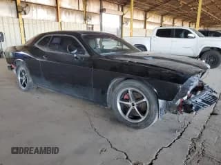 ✅ 2014 Dodge Challenger SXT • VIN: 2C3CDYAG8EH234258 • Lot: 91558035. Wystawiony na Copart z przebiegiem 84 438 mil. Bezpłatny archiwum sprzedaży aukcyjnych z USA i szczegółowy raport historii pojazdu na DreamBid. Zdjęcie 4.