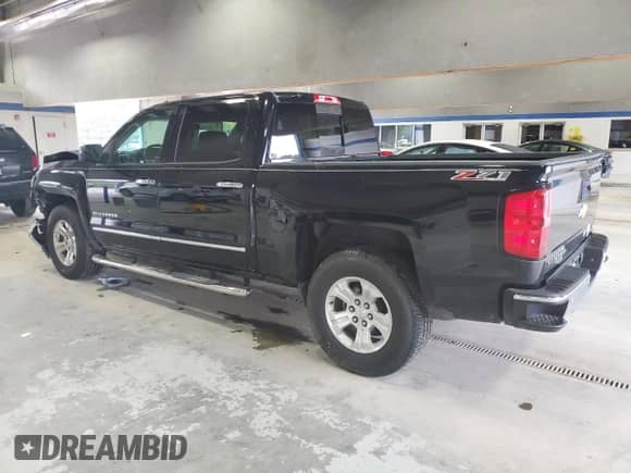 2014 Chevrolet Silverado 1500 LTZ с VIN 3GCUKSEC4EG107419, выставлен на аукционе Copart как лот 80618145 с пробегом 142 763 миль миль и Списание • Salvage title. История ставок и продаж доступна на DreamBid. Изображение 2.