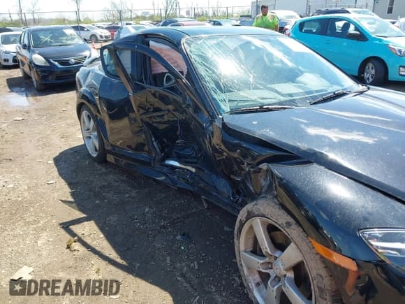 ✅ 2004 Mazda RX-8 • VIN: JM1FE173X40127877 • Lot: 42005575. Listed on IAAI with 58,411 mi. Free auction sales archive from the USA and detailed vehicle history report at DreamBid. Image 6.