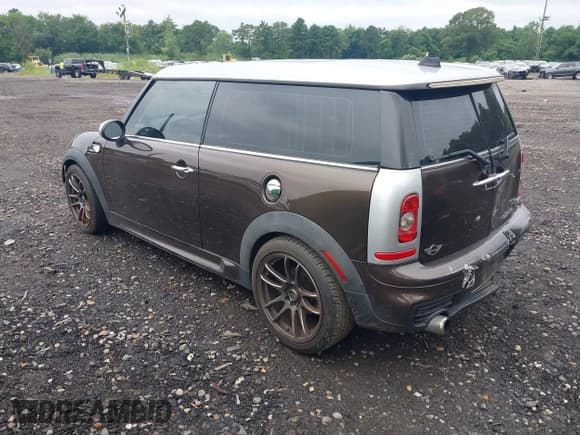 ✅ 2009 MINI Clubman S • VIN: WMWMM33569TP89990 • Lot: 42869350. Listed on IAAI with 94,090 mi. Free auction sales archive from the USA and detailed vehicle history report at DreamBid. Image 3.